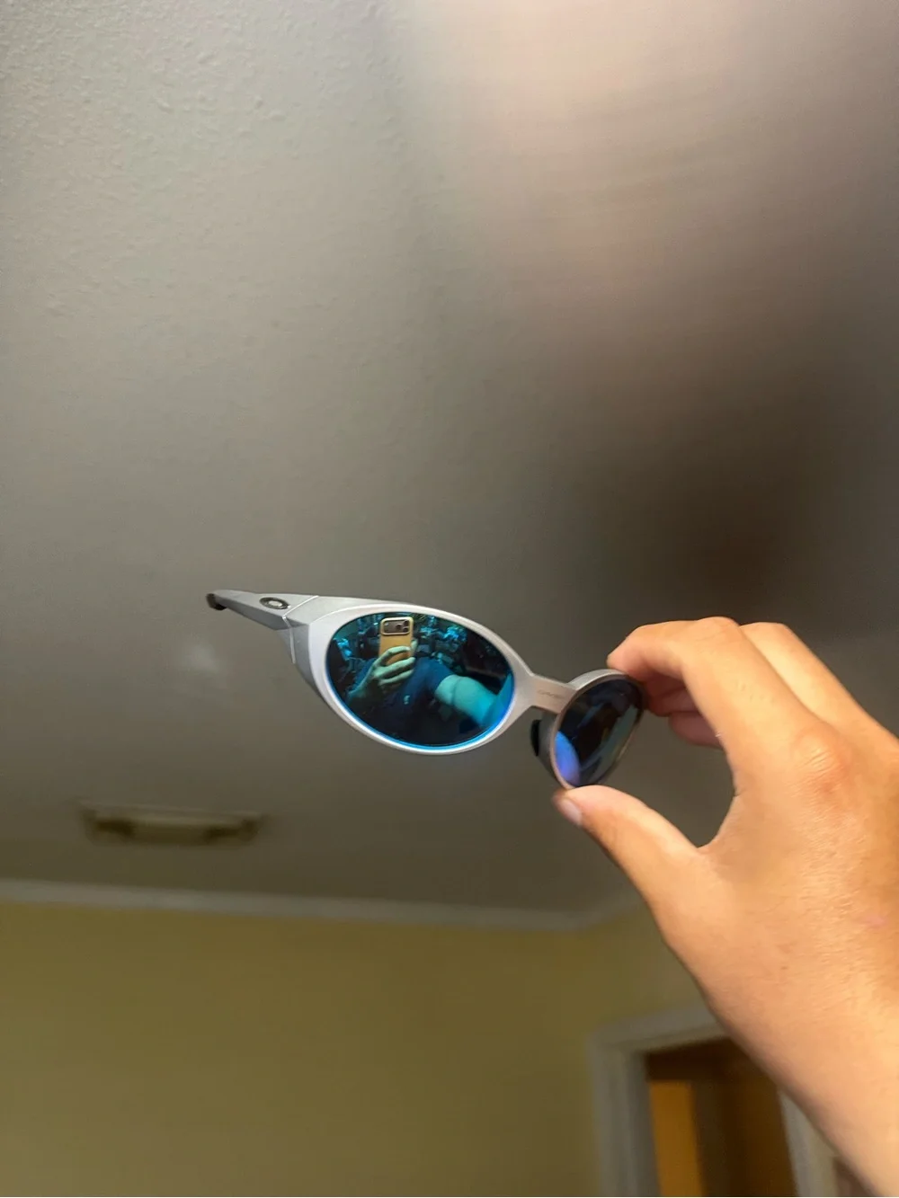 Silver Frame Sunglasses with Blue Mirrored Lenses Oakley